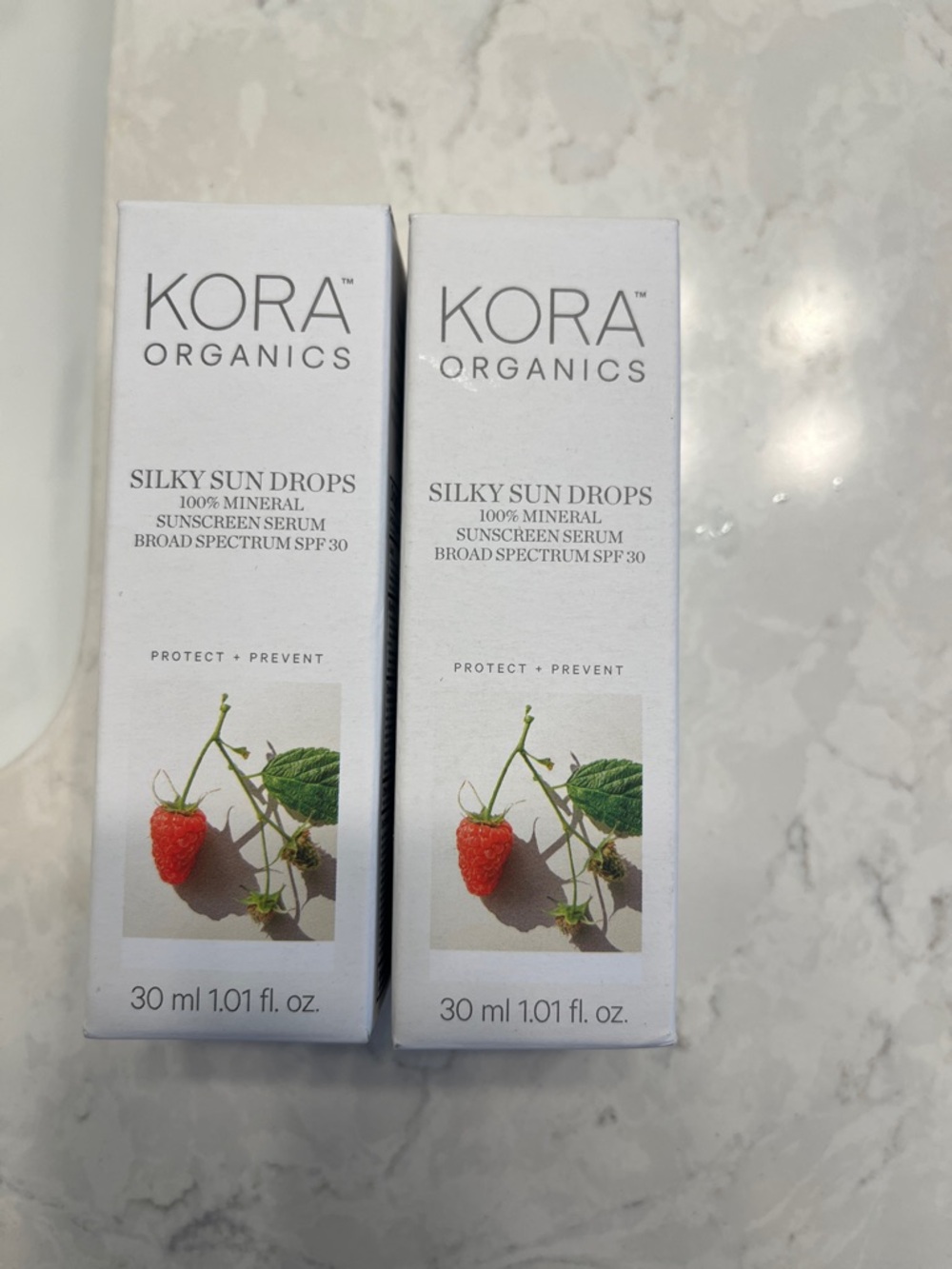 KORA Organics Silky Sun Drops SPF 30 - White with Red Accent - New, unopened